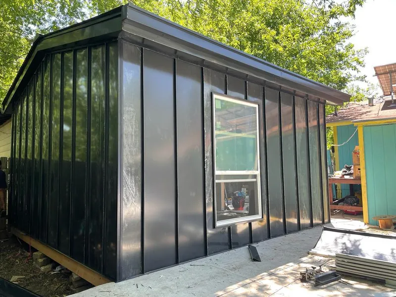 Black standing seam metal wall panels for Roof Inspection in Schenectady