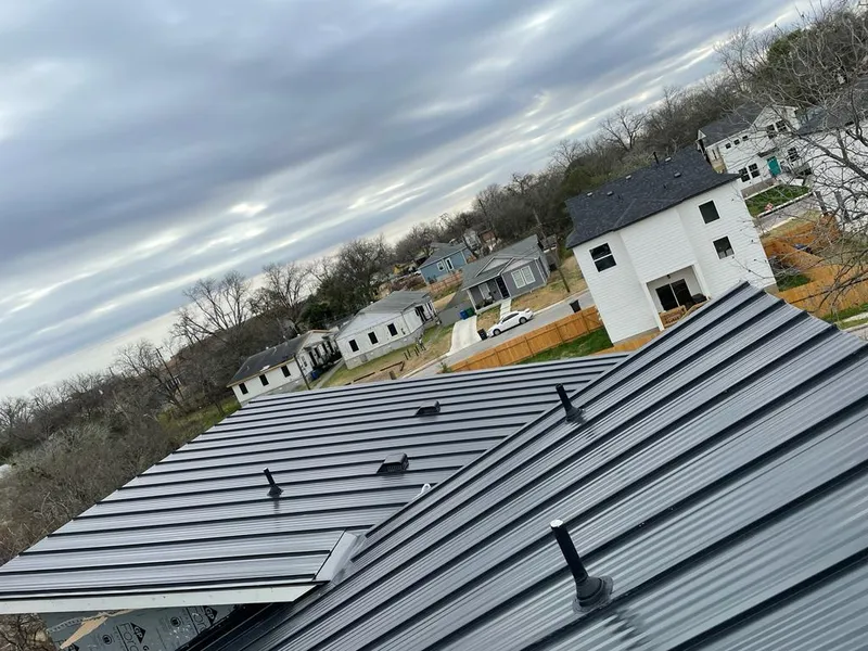 Standing seam metal roof panels with vents for Skylight Repair in Schenectady